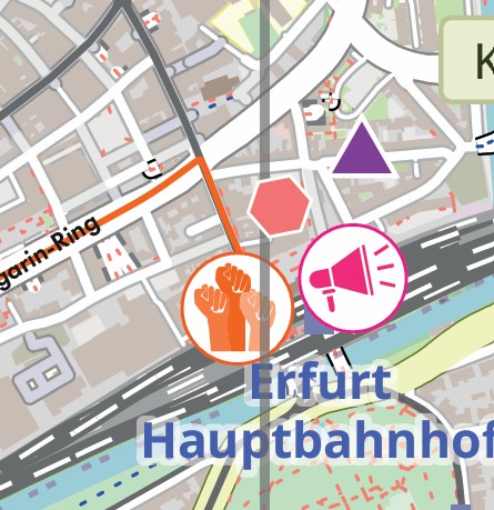 Bild des Shuttle-Treffpunkts nördlich vom Haupbahnhof Erfurt. Makiert mit einem lila Dreieck.